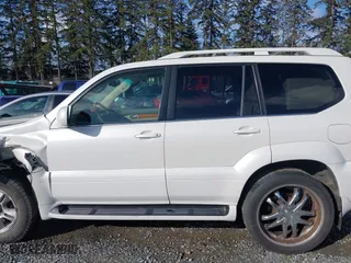 2003 Lexus GX 470 with VIN JTJBT20X330021757, listed as a IAAI auction lot 41695930 with 177,634 mi miles. Bid and sale history available at carsss.com. Image 14.