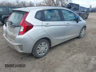 2015 Honda Fit LX with VIN 3HGGK5H57FM784299, listed as a IAAI auction lot 41863989 with 169,657 mi miles. Bid and sale history available at carsss.com. Image 4.
