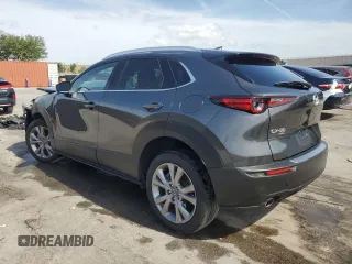 2023 Mazda CX-30 S Premium z VIN 3MVDMBDM9PM558451, wystawiony jako Copart lot #53997465 z przebiegiem 27 633 mil mil oraz Nie do naprawy • Non repairable. Historia ofert i sprzedaży dostępna na DreamBid. Obrazek 2.