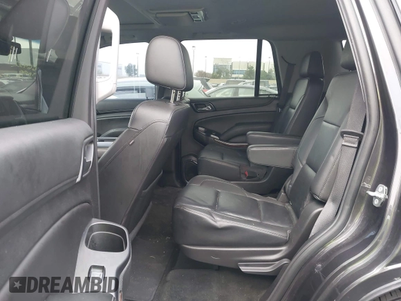 2018 Chevrolet Tahoe LT with VIN 1GNSCBKC5JR126474, listed as a IAAI auction lot 41896310 with 90,928 mi miles and . Bid and sale history available at DreamBid. Image 8.