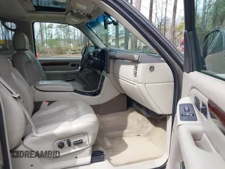 2002 Cadillac Escalade z VIN 1GYEK63N52R236906, wystawiony jako IAAI lot #41877028 z przebiegiem 185 348 mil mil oraz . Historia ofert i sprzedaży dostępna na DreamBid. Obrazek 5.