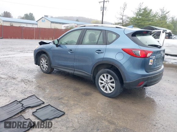 2016 Mazda CX-5 Sport with VIN JM3KE4BY5G0727608, listed as a IAAI auction lot 41975279 with 95,817 mi miles and . Bid and sale history available at carsss.com. Image 3.