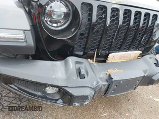 2022 Jeep Gladiator Texas Trail z VIN 1C6HJTAG2NL176011, wystawiony jako IAAI lot #42193864 z przebiegiem 27 219 mil mil oraz . Historia ofert i sprzedaży dostępna na DreamBid. Obrazek 20.