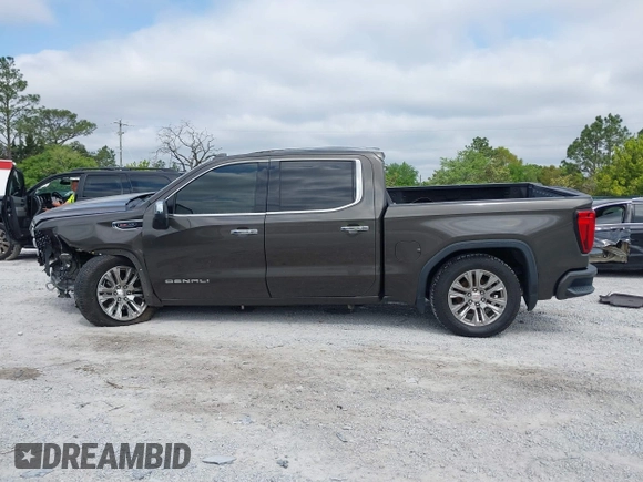 2019 GMC Sierra 1500 Denali z VIN 1GTU9FEL8KZ180128, wystawiony jako IAAI lot #42028488 z przebiegiem 78 015 mil mil oraz . Historia ofert i sprzedaży dostępna na DreamBid. Obrazek 14.