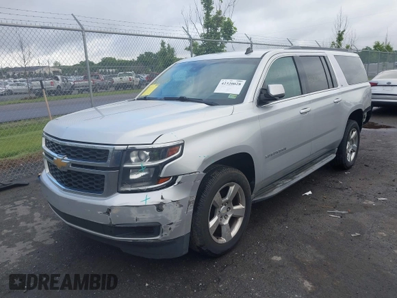 2015 Chevrolet Suburban LT z VIN 1GNSCJKC2FR144528, wystawiony jako IAAI lot #42320028 z przebiegiem 226 076 mil mil oraz . Historia ofert i sprzedaży dostępna na DreamBid. Obrazek 17.