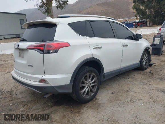 2016 Toyota RAV4 Limited with VIN JTMYFREV2GJ065656, listed as a IAAI auction lot 42575320 with 124,648 mi miles and . Bid and sale history available at DreamBid. Image 4.
