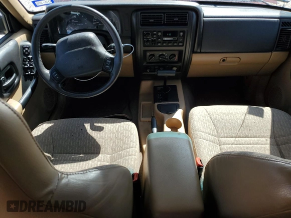 2001 Jeep Cherokee Sport with VIN 1J4FT48S21L538823, listed as a Copart auction lot 56385885 with 157,808 mi miles and Clean title. Bid and sale history available at DreamBid. Image 8.