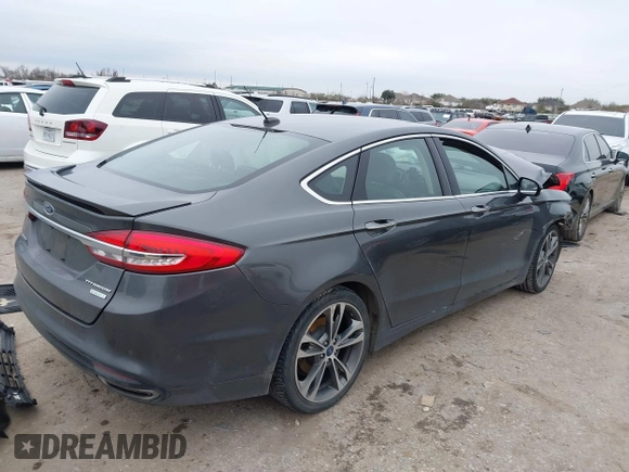 2017 Ford Fusion Titanium with VIN 3FA6P0K93HR416160, listed as a IAAI auction lot 41636451 with 100,383 mi miles. Bid and sale history available at carsss.com. Image 4.