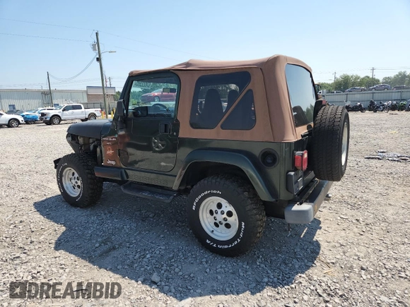 1997 Jeep Wrangler Sahara with VIN 1J4FY49S3VP519387, listed as a Copart auction lot 63822395 with 187,884 mi miles and Salvage title. Bid and sale history available at DreamBid. Image 2.