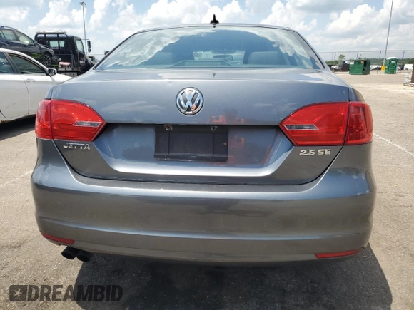 2013 Volkswagen Jetta SE with VIN 3VWDP7AJ8DM449097, listed as a Copart auction lot 62155135 with 130,266 mi miles and Salvage title. Bid and sale history available at DreamBid. Image 6.
