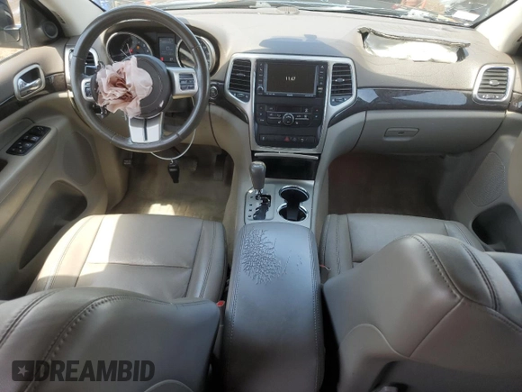2011 Jeep Grand Cherokee Laredo with VIN 1J4RR4GG5BC703628, listed as a Copart auction lot 58626925 with 152,426 mi miles and Salvage title. Bid and sale history available at DreamBid. Image 8.