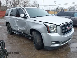 2018 GMC Yukon SLE with VIN 1GKS2AKC5JR253543, listed as a IAAI auction lot 41486309 with 81,322 mi miles. Bid and sale history available at carsss.com. Image 1.
