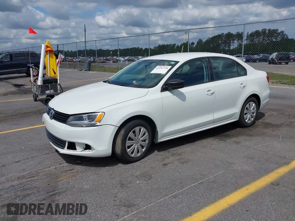 2014 Volkswagen Jetta Sedan S with VIN 3VW2K7AJ6EM334635, listed as a IAAI auction lot 42151738 with 142,923 mi miles. Bid and sale history available at carsss.com. Image 2.