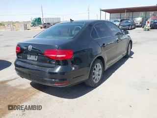 2015 Volkswagen Jetta SE z VIN 3VWD17AJ8FM418758, wystawiony jako IAAI lot #42449833 z przebiegiem 146 618 mil mil oraz . Historia ofert i sprzedaży dostępna na DreamBid. Obrazek 4.