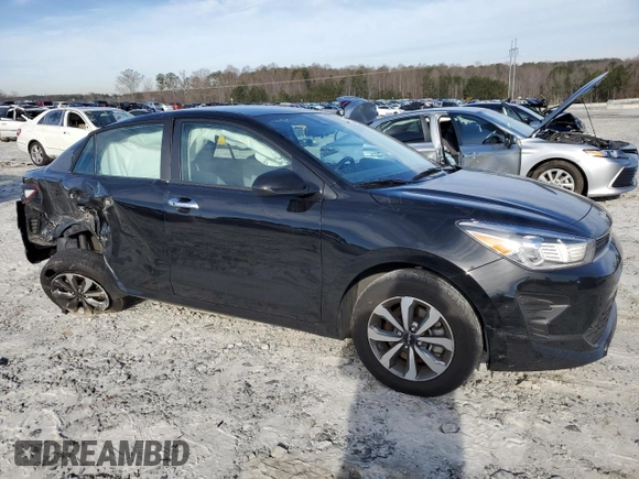 2023 Kia Rio LX with VIN 3KPA24AD1PE590234, listed as a Copart auction lot 45710935 with 42,405 mi miles and Salvage Title. Bid and sale history available at DreamBid. Image 4.