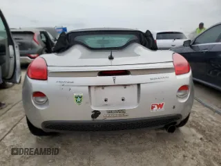 2009 Pontiac Solstice z VIN 1G2MN35B59Y107109, wystawiony jako Copart lot #76083734 z przebiegiem Nie podano mil oraz Nie do naprawy • Non repairable. Historia ofert i sprzedaży dostępna na DreamBid. Obrazek 6.