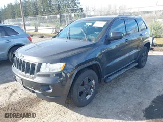 2011 Jeep Grand Cherokee Laredo with VIN 1J4RR4GG2BC670264, listed as a IAAI auction lot 41670045 with 252,044 mi miles. Bid and sale history available at carsss.com. Image 2.