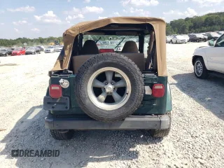 2001 Jeep Wrangler Sahara with VIN 1J4FA59S71P339334, listed as a Copart auction lot 74805224 with 265,778 mi miles and Salvage Title. Bid and sale history available at carsss.com. Image 6.