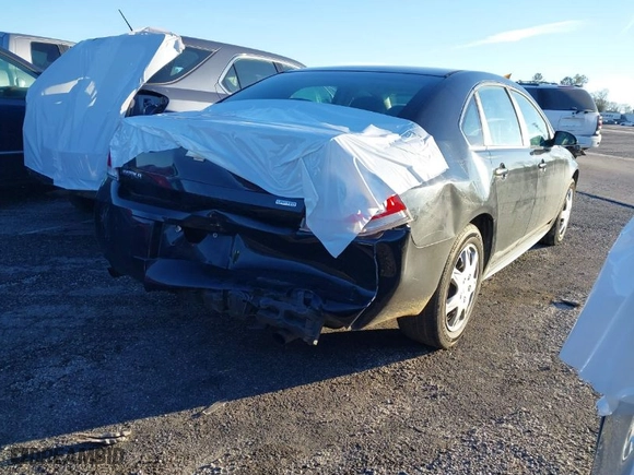 2014 Chevrolet Impala Limited Police Police with VIN 2G1WD5E39E1110595, listed as a IAAI auction lot 41261653 with NaN miles. Bid and sale history available at carsss.com. Image 4.