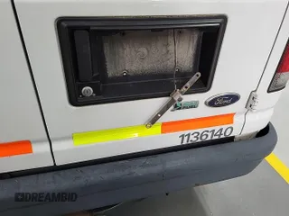 2013 Ford Econoline Cargo Commercial with VIN 1FTNE1EW6DDB01438, listed as a IAAI auction lot 42737683 with 125,160 mi miles and . Bid and sale history available at DreamBid. Image 4.