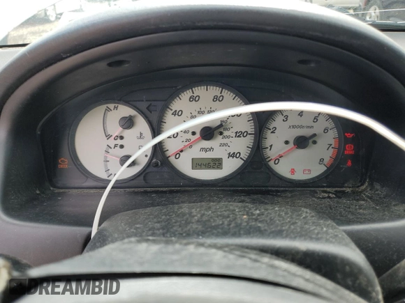 2002 Mazda Protege z VIN JM1BJ245721470434, wystawiony jako Copart lot #57293765 z przebiegiem 144 622 mil mil oraz Szkoda całkowita • Salvage title. Historia ofert i sprzedaży dostępna na DreamBid. Obrazek 9.