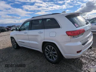 2017 Jeep Grand Cherokee Overland with VIN 1C4RJFCG7HC707767, listed as a Copart auction lot 82345154 with 96,374 mi miles and Salvage Title. Bid and sale history available at carsss.com. Image 2.