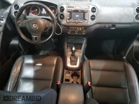 2013 Volkswagen Tiguan S with VIN WVGAV3AX7DW069012, listed as a Copart auction lot 55720975 with 133,381 mi miles and Salvage title. Bid and sale history available at DreamBid. Image 8.
