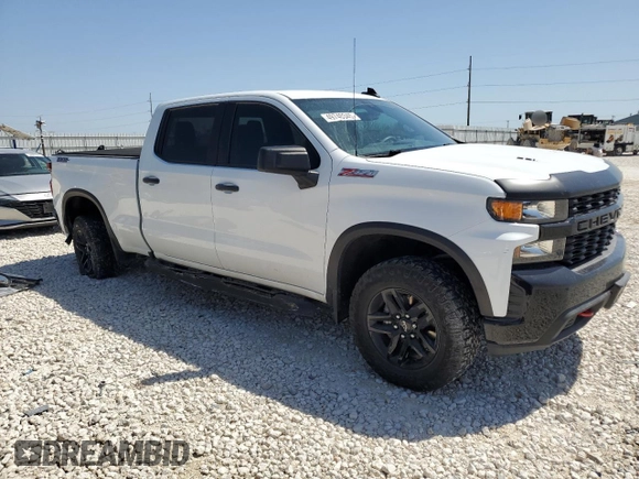 2022 Chevrolet Silverado 1500 Custom Trail Boss with VIN 3GCPYCEL8NG123561, listed as a Copart auction lot 49740345 with 34,837 mi miles and Salvage Title. Bid and sale history available at DreamBid. Image 4.