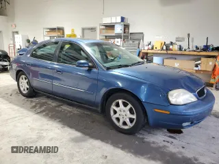 2002 Mercury Sable LS with VIN 1MEHM55S12A654810, listed as a Copart auction lot 83073514 with 185,246 mi miles and Salvage Title. Bid and sale history available at DreamBid. Image 4.