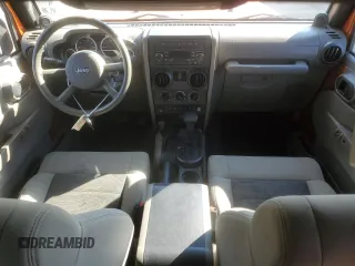 2010 Jeep Wrangler Rubicon with VIN 1J4BA6D17AL208835, listed as a Copart auction lot 41851855 with 107,771 mi miles and Salvage title. Bid and sale history available at DreamBid. Image 8.