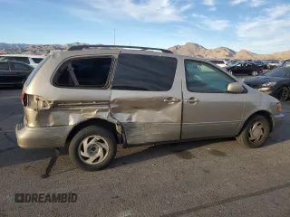 2002 Toyota Sienna LE with VIN 4T3ZF13C12U486009, listed as a Copart auction lot 87877695 with 250,778 mi miles and Salvage Title. Bid and sale history available at carsss.com. Image 3.