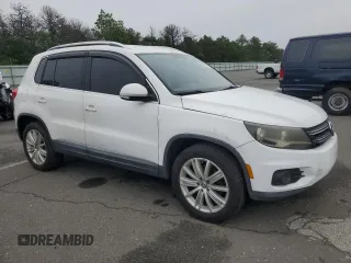 2013 Volkswagen Tiguan SE with VIN WVGAV3AX1DW574009, listed as a Copart auction lot 60936735 with 121,624 mi miles and Clean title. Bid and sale history available at DreamBid. Image 4.