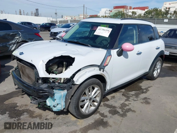 2014 MINI Countryman S with VIN WMWZC3C52EWP26869, listed as a IAAI auction lot 41756310 with 91,941 mi miles and . Bid and sale history available at DreamBid. Image 2.