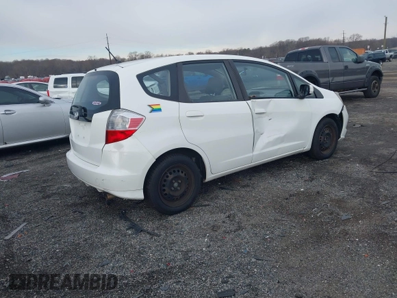 2013 Honda Fit with VIN JHMGE8H39DC005052, listed as a IAAI auction lot 41008236 with 124,874 mi miles. Bid and sale history available at carsss.com. Image 4.