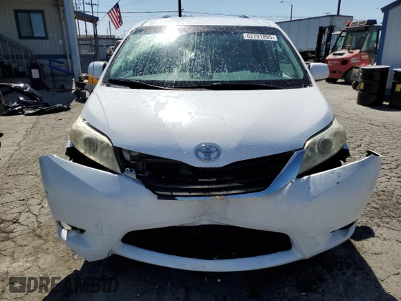 2012 Toyota Sienna LE AAS z VIN 5TDKK3DC8CS241301, wystawiony jako Copart lot #62791895 z przebiegiem 167 439 mil mil oraz Szkoda całkowita • Salvage title. Historia ofert i sprzedaży dostępna na DreamBid. Obrazek 5.