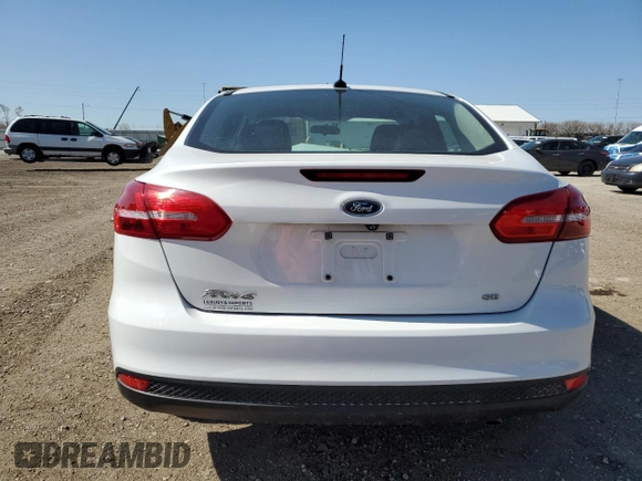 2017 Ford Focus SE with VIN 1FADP3F27HL320293, listed as a Copart auction lot 51782275 with 24,789 mi miles and Salvage title. Bid and sale history available at DreamBid. Image 6.