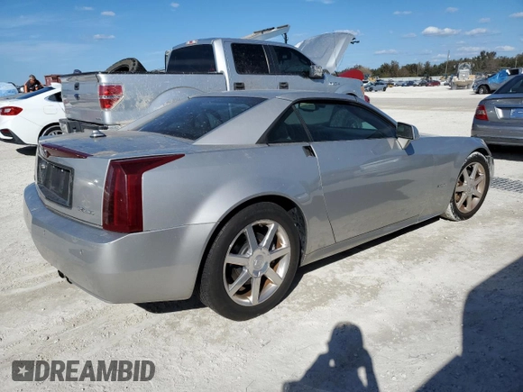 2005 Cadillac XLR z VIN 1G6YV34A455601742, wystawiony jako Copart lot #77878544 z przebiegiem Nie podano mil oraz Szkoda całkowita • Salvage title. Historia ofert i sprzedaży dostępna na DreamBid. Obrazek 3.
