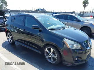 2009 Pontiac Vibe GT with VIN 5Y2SR67079Z402663, listed as a IAAI auction lot 41988825 with 166,630 mi miles. Bid and sale history available at carsss.com. Image 1.