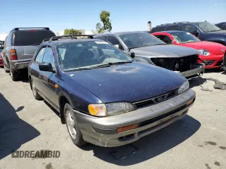 1996 Subaru Impreza Outback with VIN JF1GF4851TG811571, listed as a Copart auction lot 65650514 with 248,315 mi miles and Salvage title. Bid and sale history available at DreamBid. Image 4.