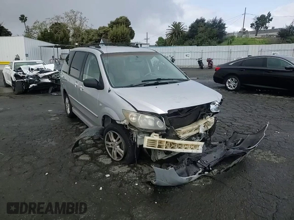 2004 Mazda MPV LX with VIN JM3LW28A840523283, listed as a Copart auction lot 51441785 with 215,235 mi miles and Salvage title. Bid and sale history available at DreamBid. Image 12.