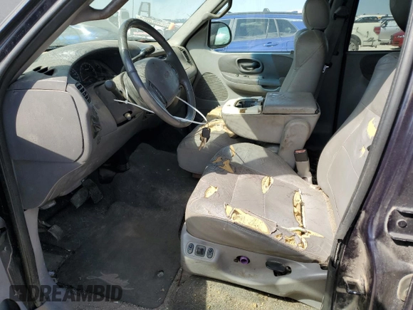 2001 Ford F-150 XLT with VIN 1FTRW08W41KF57904, listed as a Copart auction lot 47250035 with 185,985 mi miles and Clean title. Bid and sale history available at DreamBid. Image 7.