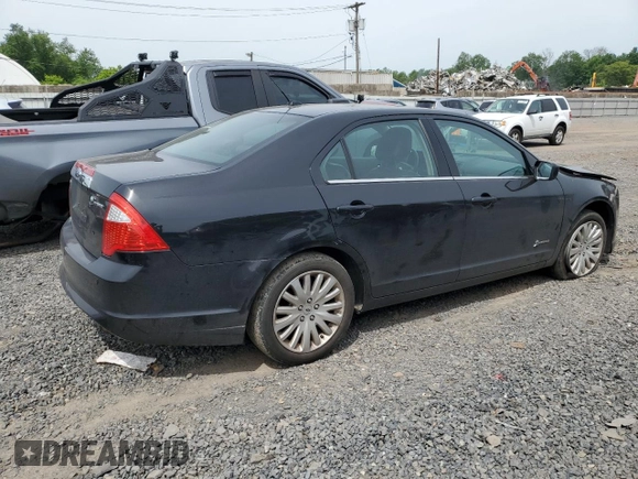 2010 Ford Fusion Hybrid с VIN 3FADP0L34AR129353, выставлен на аукционе Copart как лот 58310725 с пробегом 237 662 миль миль и Списание • Salvage title. История ставок и продаж доступна на DreamBid. Изображение 3.