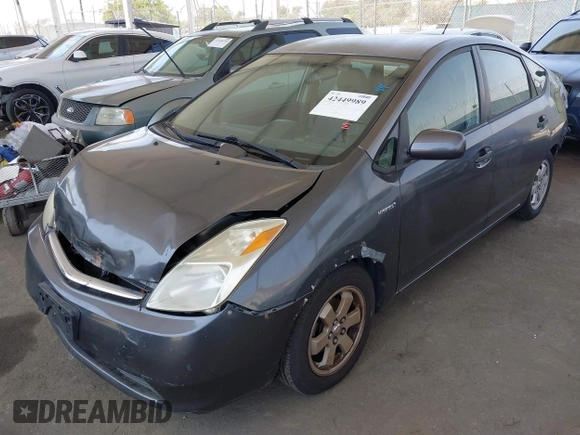 2007 Toyota Prius z VIN JTDKB20UX73281542, wystawiony jako IAAI lot #42449989 z przebiegiem 164 111 mil mil oraz . Historia ofert i sprzedaży dostępna na DreamBid. Obrazek 2.