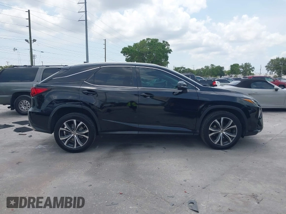 2016 Lexus RX 350 with VIN 2T2ZZMCA6GC023710, listed as a IAAI auction lot 42201278 with 126,873 mi miles and . Bid and sale history available at DreamBid. Image 13.