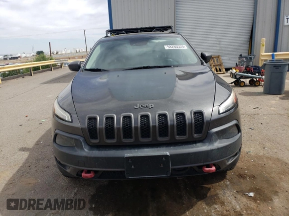 2014 Jeep Cherokee Trailhawk with VIN 1C4PJMBS6EW140981, listed as a Copart auction lot 58260325 with 97,036 mi miles and Salvage title. Bid and sale history available at DreamBid. Image 5.