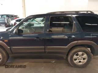 2003 Mazda Tribute LX with VIN 4F2YZ94193KM56345, listed as a IAAI auction lot 41200769 with 141,728 mi miles and . Bid and sale history available at DreamBid. Image 14.