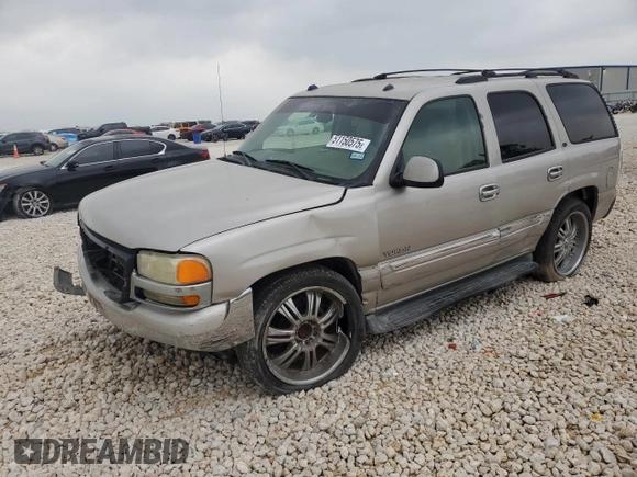 2004 GMC Yukon SLT with VIN 1GKEC13Z34R313210, listed as a Copart auction lot 51150575 with 328,961 mi miles and Salvage Title. Bid and sale history available at carsss.com. Image 1.