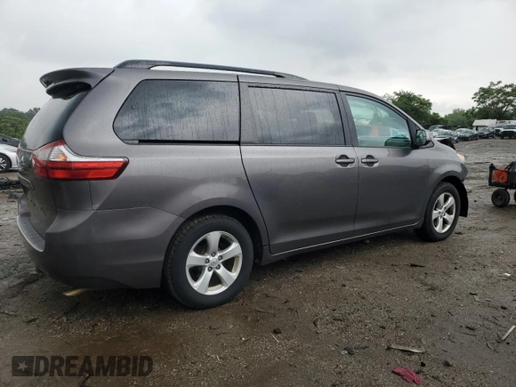 2015 Toyota Sienna LE AAS with VIN 5TDKK3DC3FS572405, listed as a Copart auction lot 58141975 with 146,820 mi miles and Salvage title. Bid and sale history available at DreamBid. Image 3.