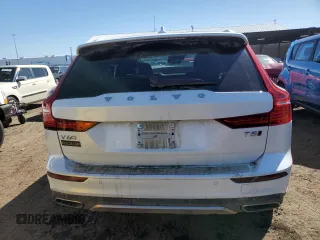 2021 Volvo V60 z VIN YV4102WKXM1069073, wystawiony jako Copart lot #47275314 z przebiegiem 45 882 mil mil oraz . Historia ofert i sprzedaży dostępna na DreamBid. Obrazek 6.