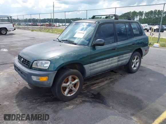 1999 Toyota RAV4 with VIN JT3GP10V4X7052720, listed as a IAAI auction lot 42490948 with 321,165 mi miles and . Bid and sale history available at DreamBid. Image 2.